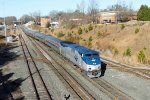 AMTK 132 leads train P080-30 across Boylan towards RUS